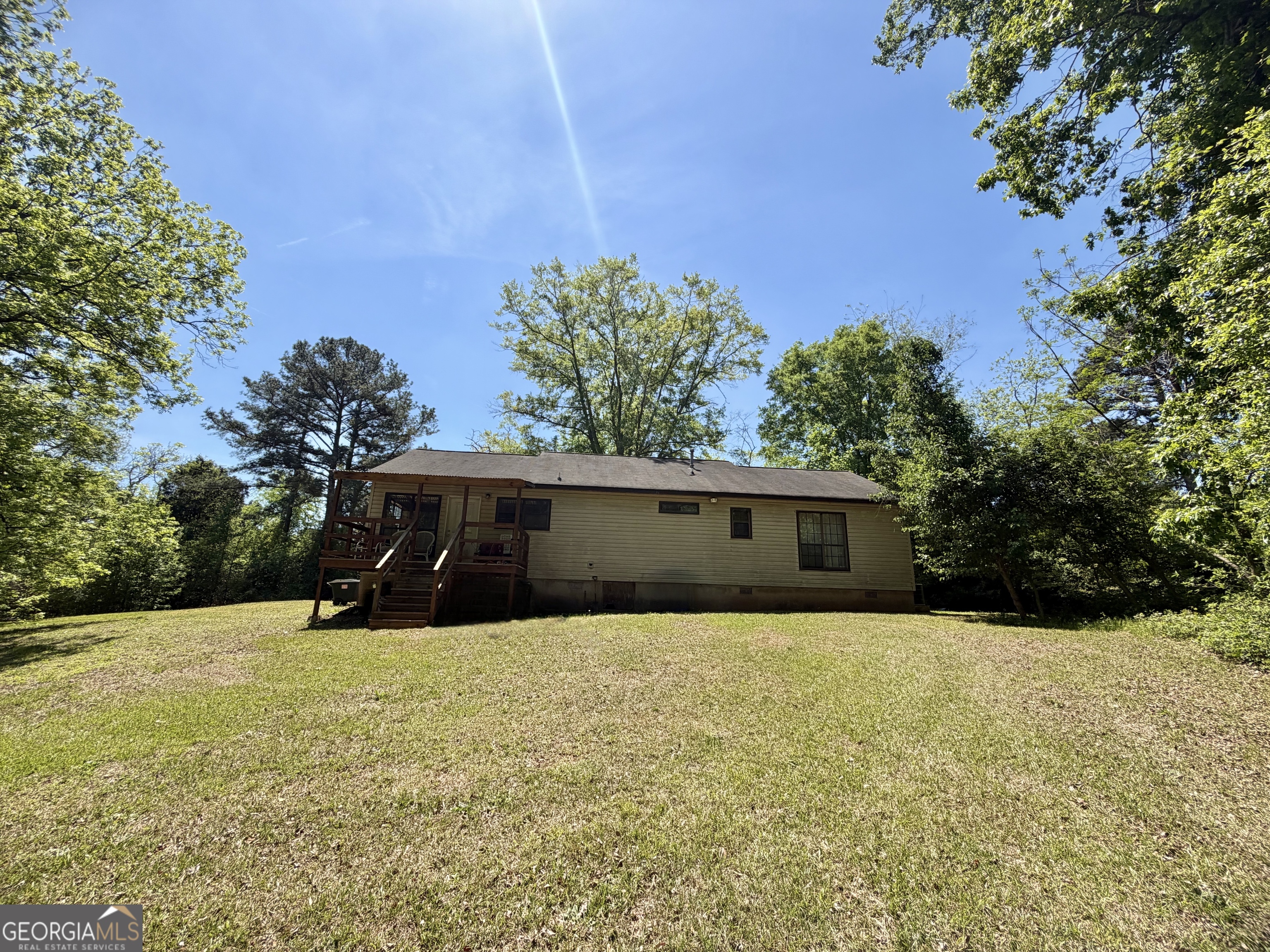 276 Oglesby Bridge Road Southeast Conyers, GA 30094 - Photo 6 of 49 a view of an outdoor space and a yard