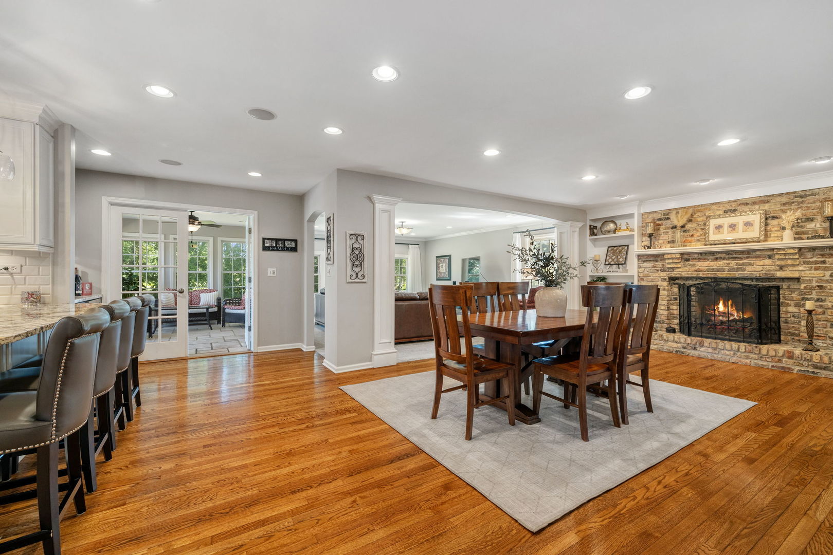 453 Brighton Drive Wheaton, IL 60189 - Photo 14 of 40 a view of a a dining room with furniture window and wooden floor