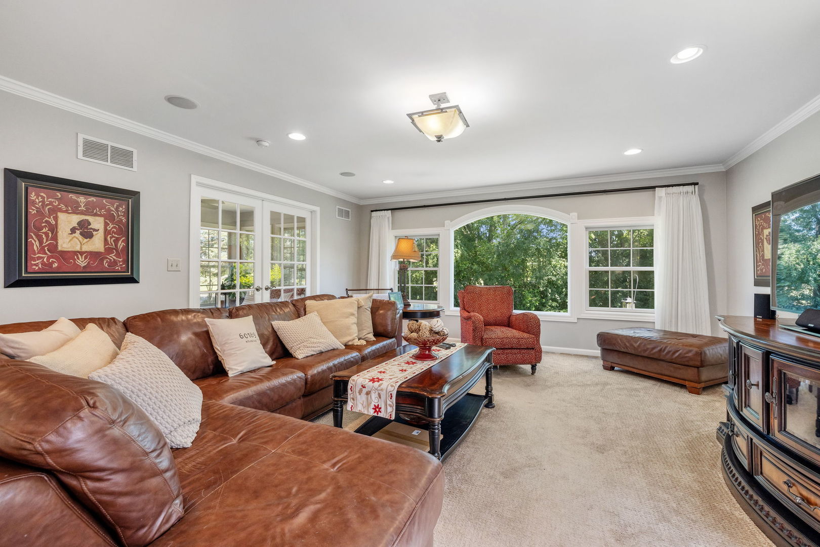453 Brighton Drive Wheaton, IL 60189 - Photo 16 of 40 a living room with furniture and large windows