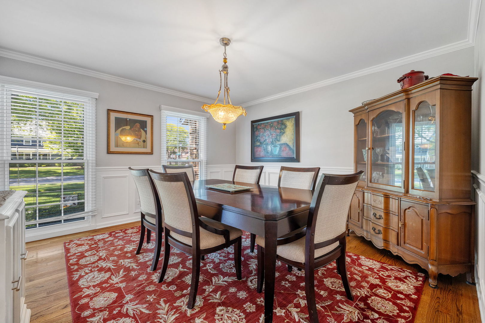 453 Brighton Drive Wheaton, IL 60189 - Photo 19 of 40 a view of a dining room with furniture window and wooden floor