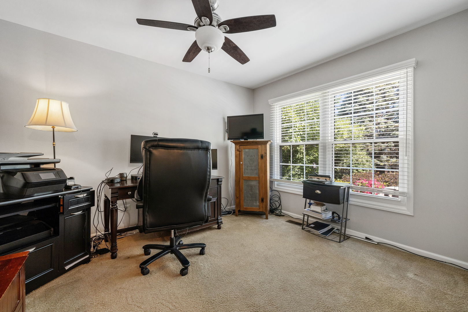 453 Brighton Drive Wheaton, IL 60189 - Photo 20 of 40 a view of a workspace with furniture and a window