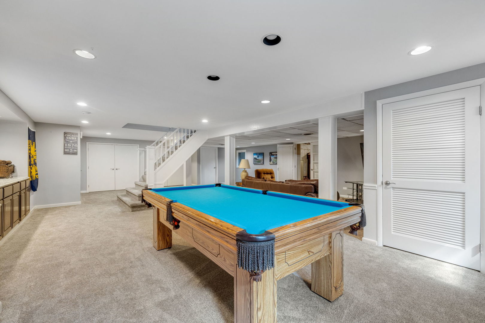 453 Brighton Drive Wheaton, IL 60189 - Photo 24 of 40 a room with pool table and stairs