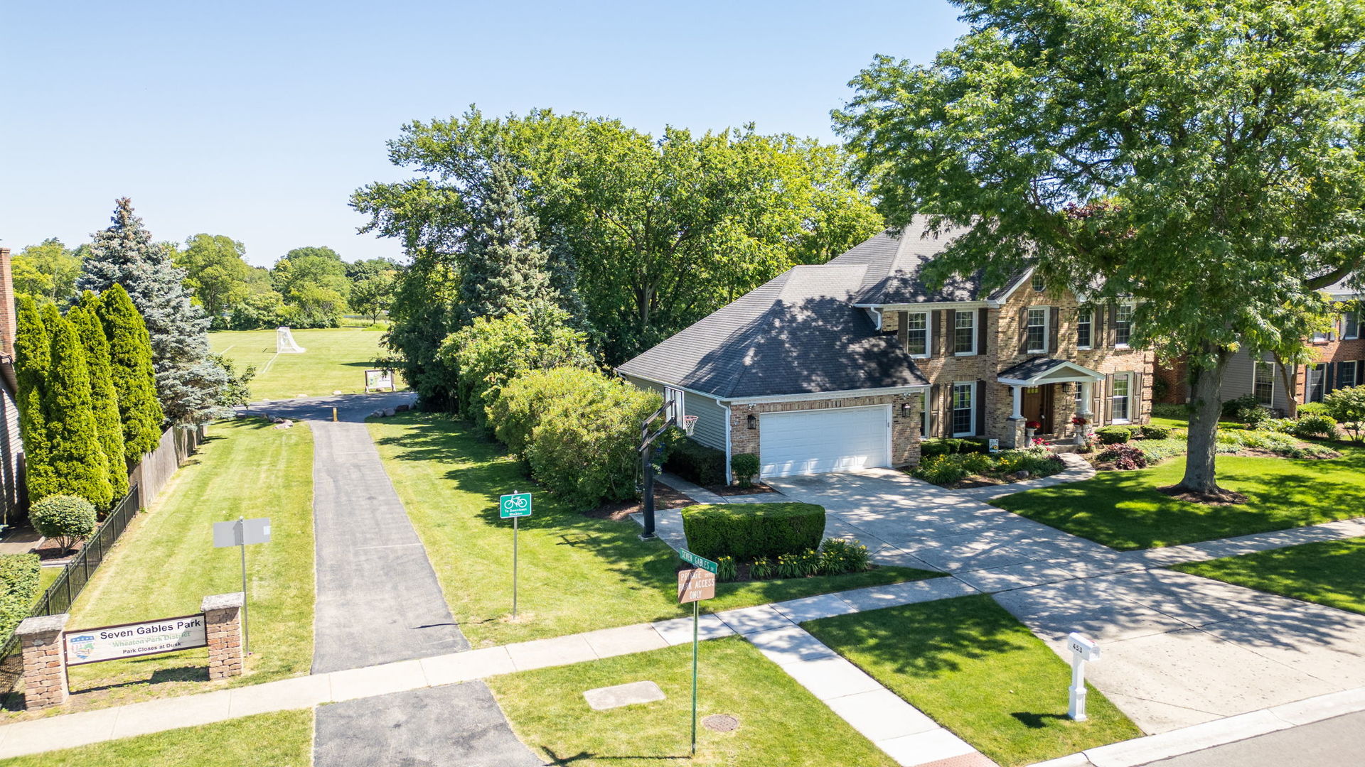 453 Brighton Drive Wheaton, IL 60189 - Photo 34 of 40 a view of a house with swimming pool