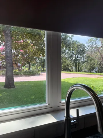a view of swimming pool from a window