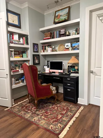 a view of a workspace with furniture