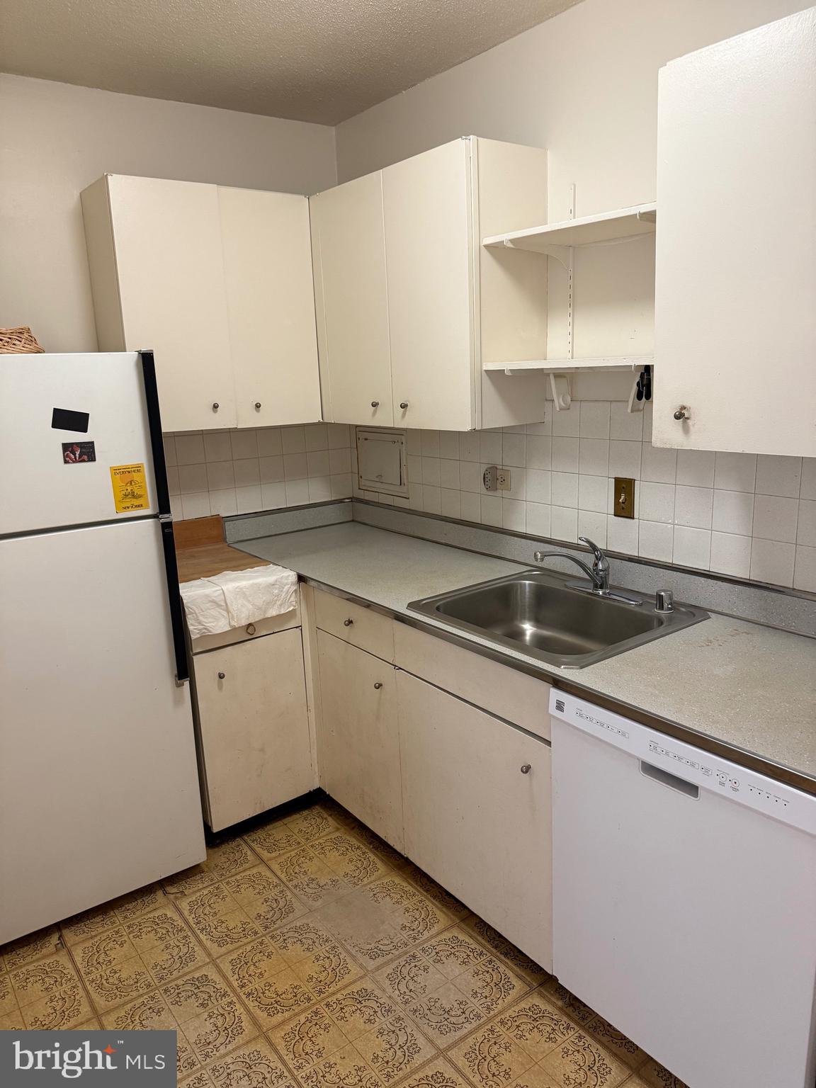 1311 Delaware Avenue Southwest, Unit S540 Washington, DC 20024 - Photo 14 of 17 a kitchen that has a sink and a stove