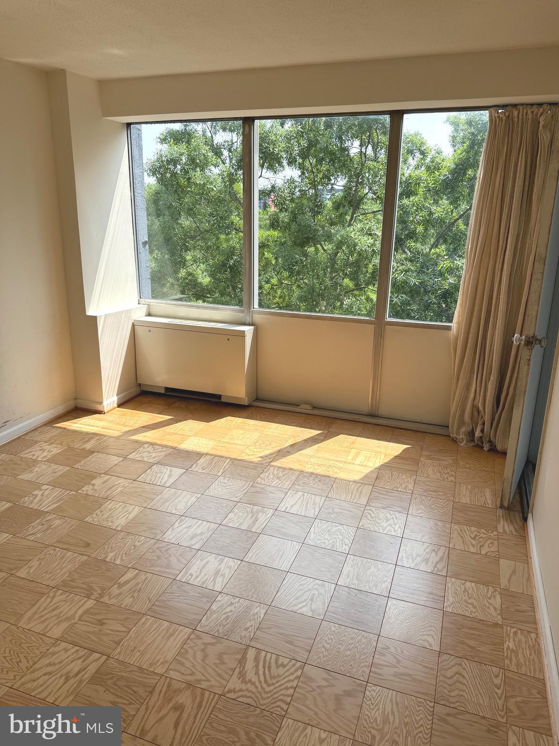 1311 Delaware Avenue Southwest, Unit S540 Washington, DC 20024 - Photo 15 of 17 a view of an empty room with a window
