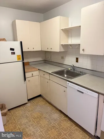 a view of a room with large windows