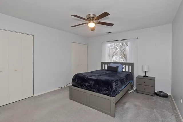 a living room with furniture and windows