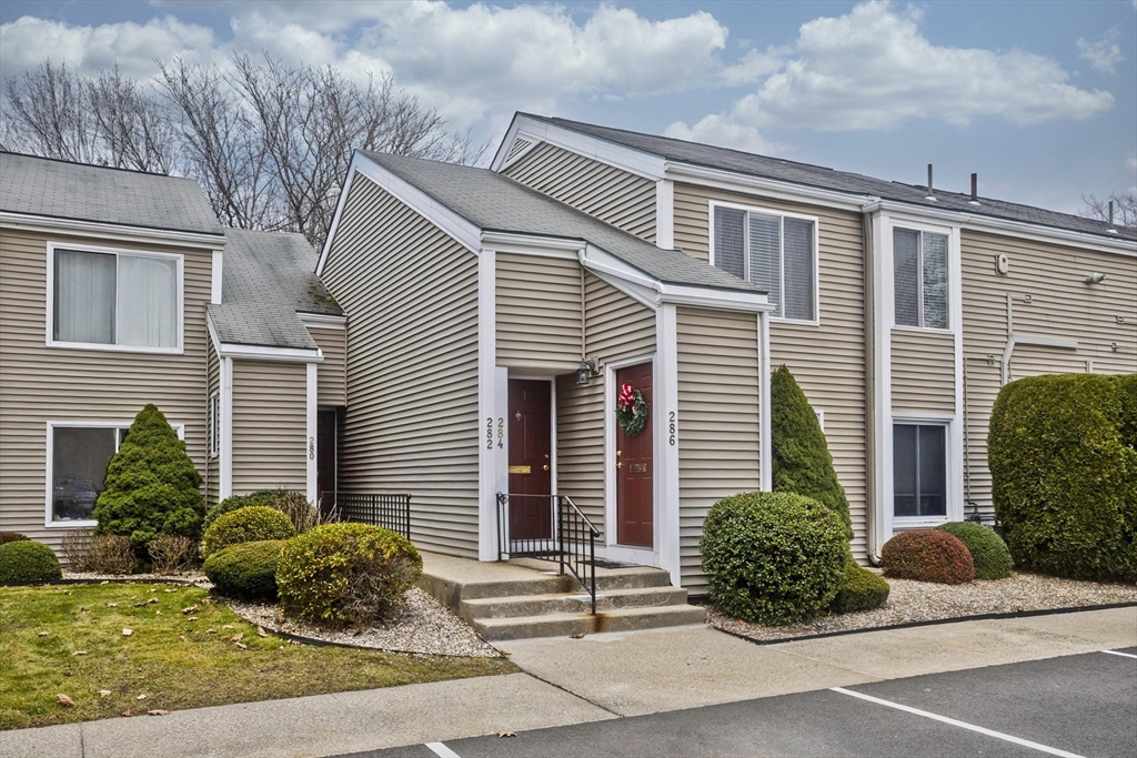 286 Nassau Drive, Unit 286 Springfield, MA 01129 - Photo 19 of 19 a view of a house with a patio