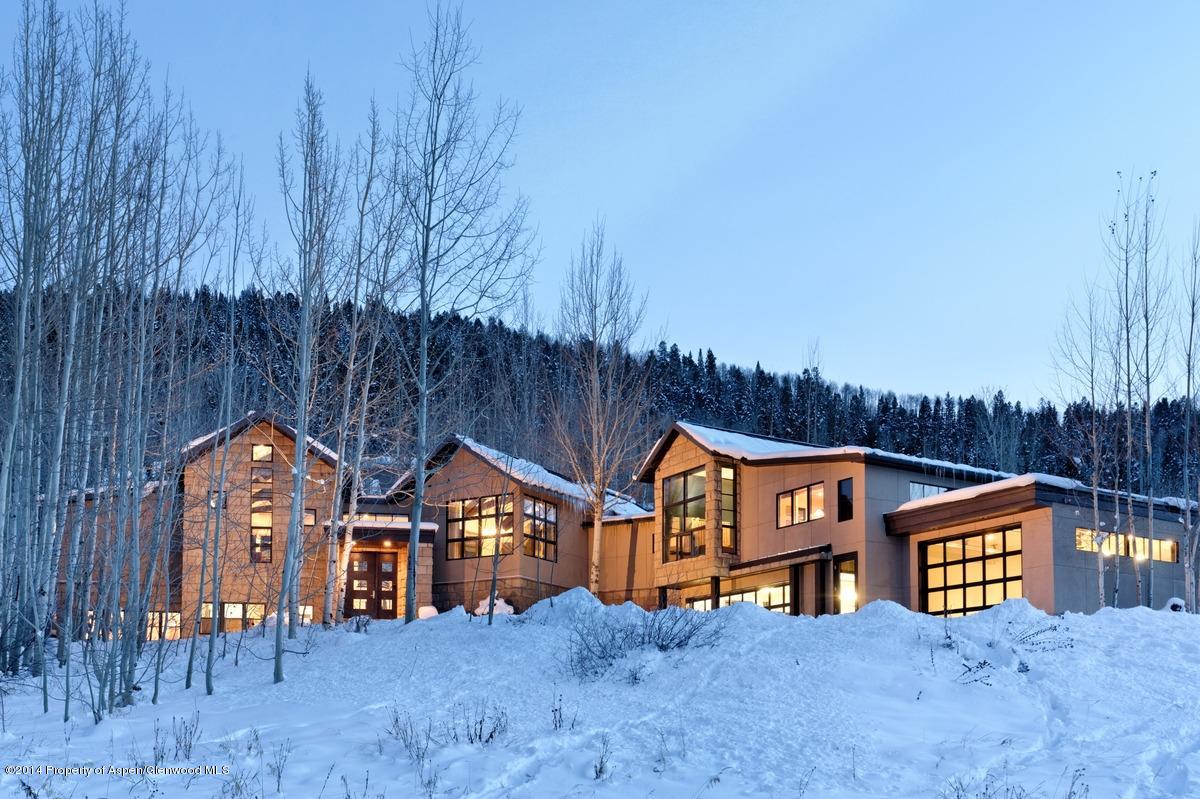 416 Moore Drive Aspen, CO 81611 - Photo 2 of 28 a view of a house with wooden fence