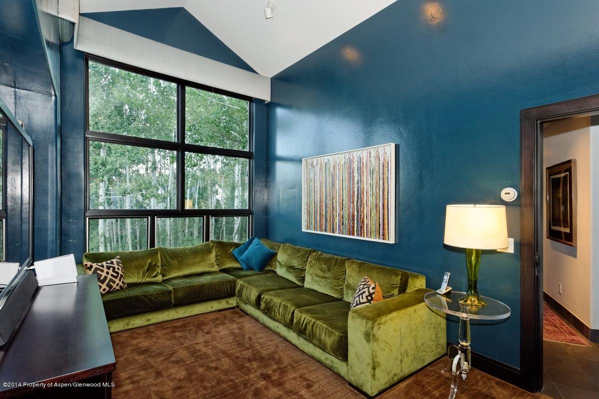 416 Moore Drive Aspen, CO 81611 - Photo 23 of 28 a living room with furniture and a lamp