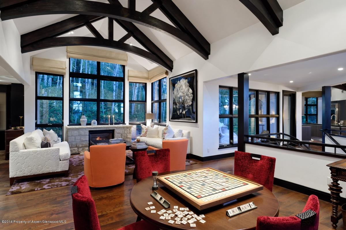 416 Moore Drive Aspen, CO 81611 - Photo 6 of 28 a living room with furniture and floor to ceiling window