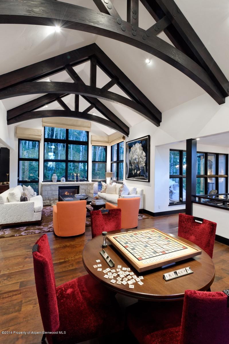 416 Moore Drive Aspen, CO 81611 - Photo 7 of 28 a living room with furniture and a book shelf
