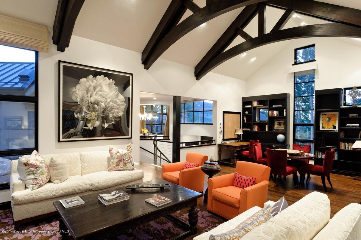 416 Moore Drive Aspen, CO 81611 - Photo 9 of 28 a living room with furniture a rug and a large window