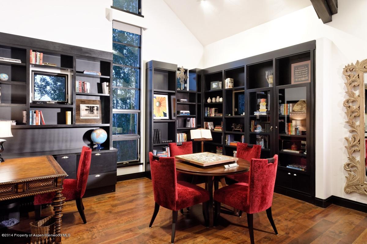416 Moore Drive Aspen, CO 81611 - Photo 10 of 28 a view of a dining room with furniture and wooden floor