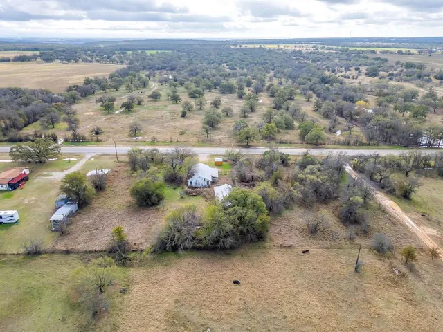 a view of lake with green space