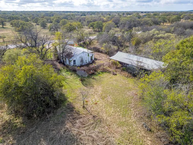 a bird view of a house and a yard