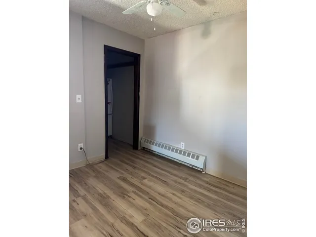 a view of a hallway with closet