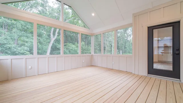 a view of walk in closet with wooden floor