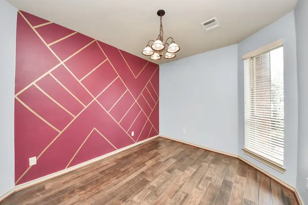 a view of an empty room with window