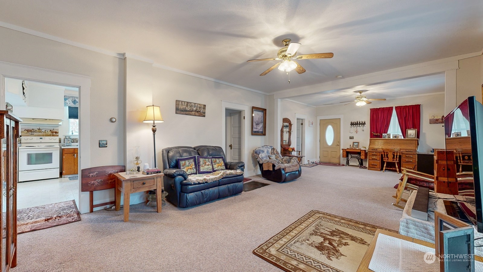 76 Marr Road Prescott, WA 99348 - Photo 17 of 40 a living room with furniture and a chandelier