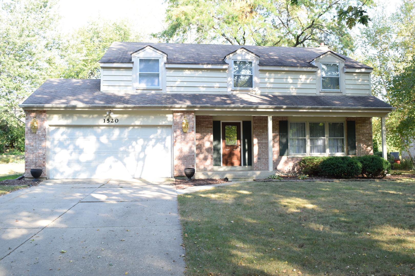 1520 Chippewa Drive Naperville, IL 60563 - Photo 1 of 18 a front view of a house with a yard