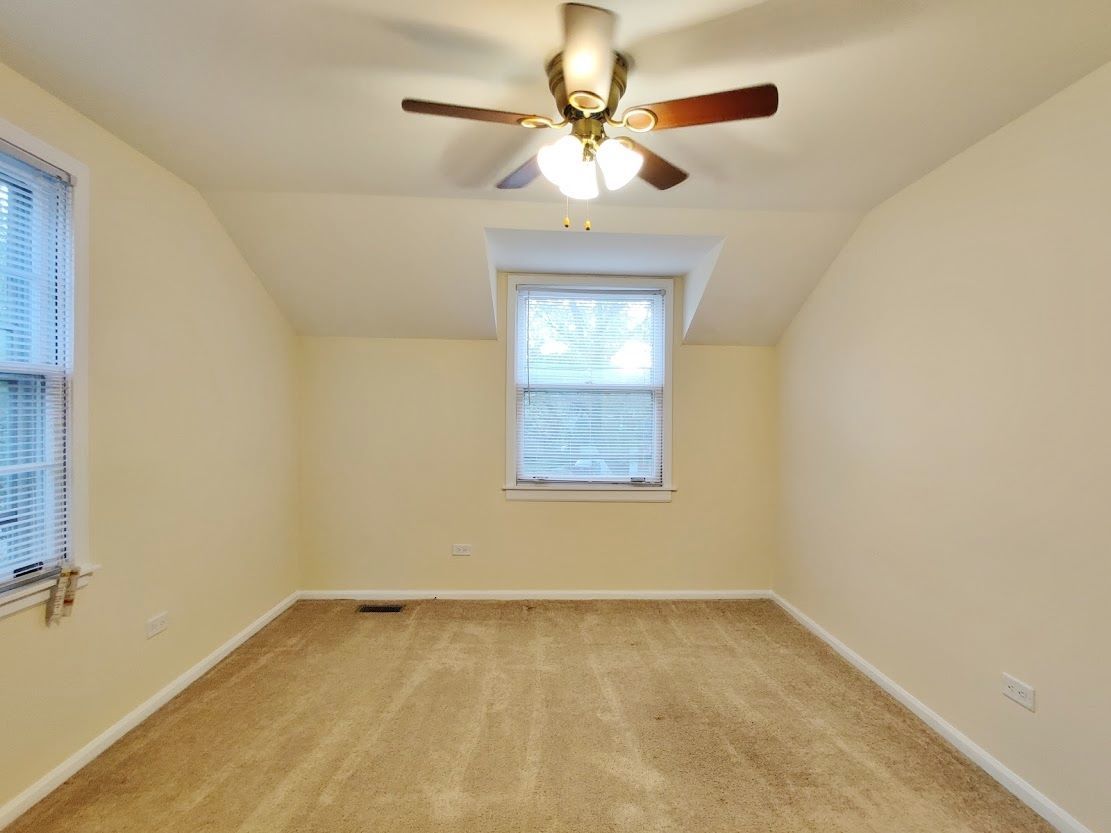 1520 Chippewa Drive Naperville, IL 60563 - Photo 11 of 18 a view of an empty room with a window