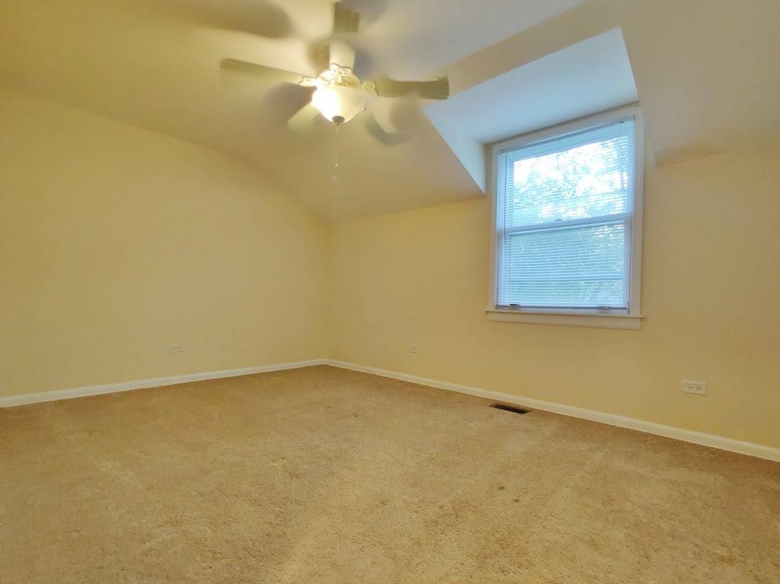 1520 Chippewa Drive Naperville, IL 60563 - Photo 15 of 18 an empty room with a window