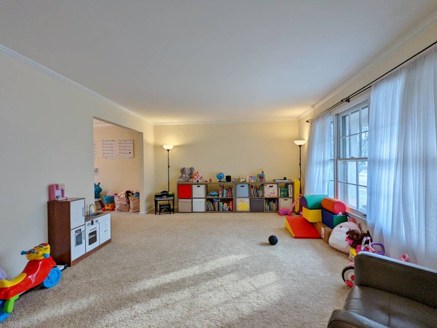 1520 Chippewa Drive Naperville, IL 60563 - Photo 2 of 18 a view of a room with toys and a living room