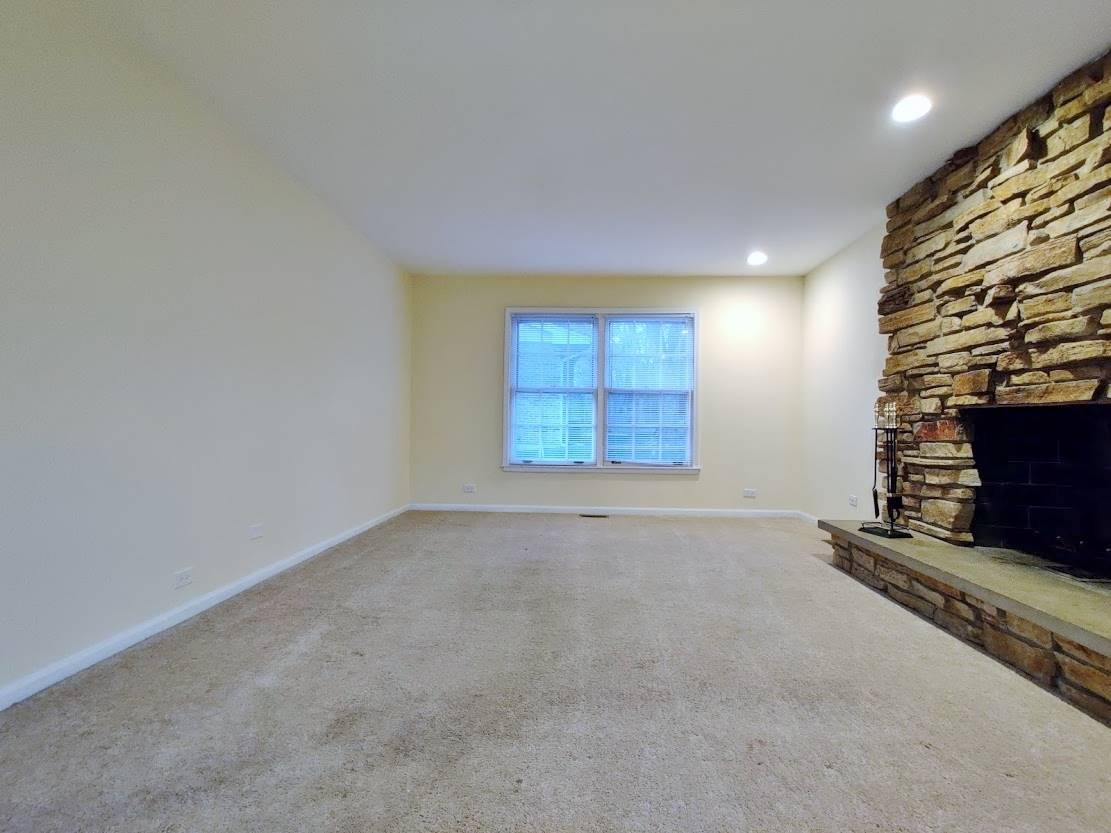 1520 Chippewa Drive Naperville, IL 60563 - Photo 8 of 18 an empty room with windows