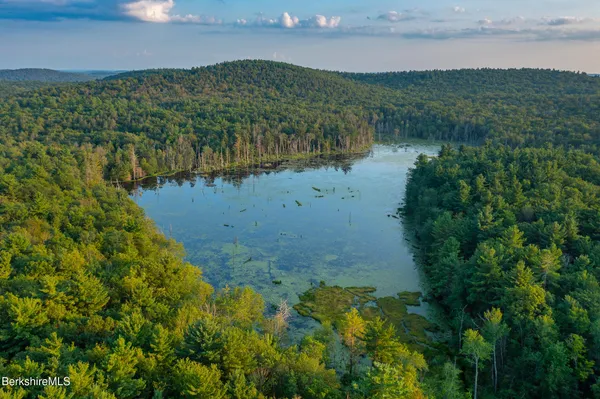 a view of a chairs and tables in a room