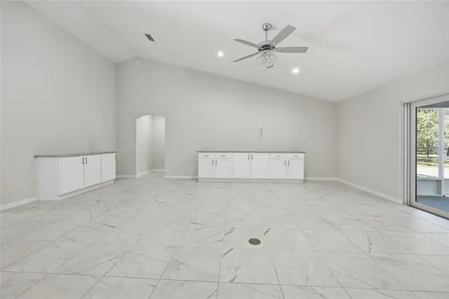 a kitchen with a sink and a wooden cabinets