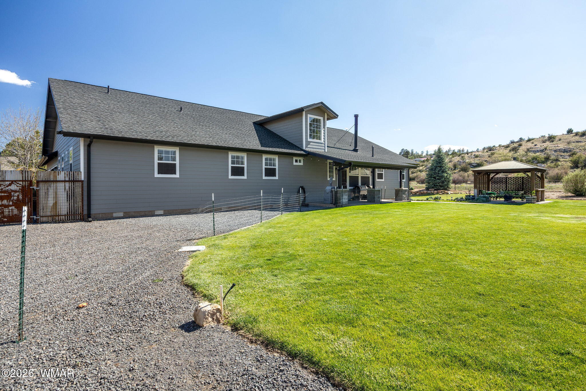 1940 Stonegate Way Heber, AZ 85928 - Photo 46 of 62 a house view with a garden space