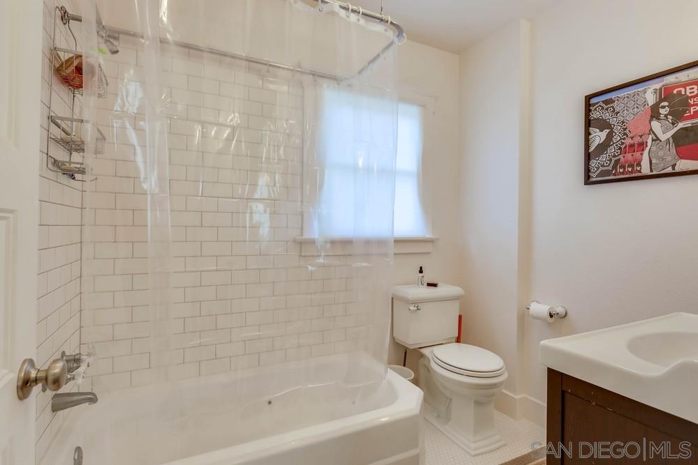 2525 E Street San Diego, CA 92102 - Photo 15 of 46 a bathroom with a toilet and a sink