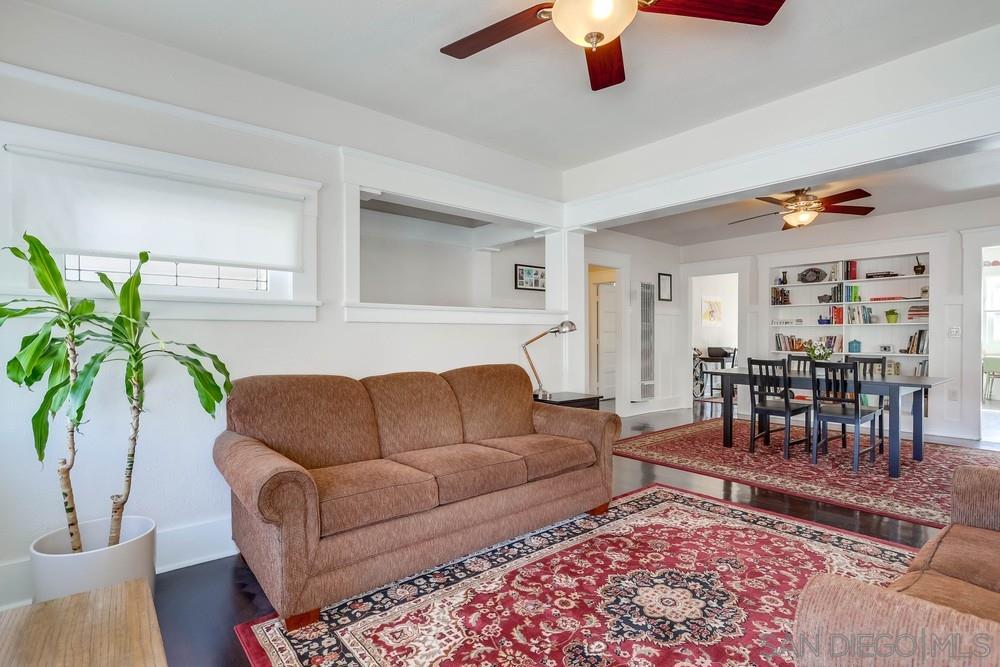 2525 E Street San Diego, CA 92102 - Photo 7 of 46 a living room with furniture a rug and a potted plant