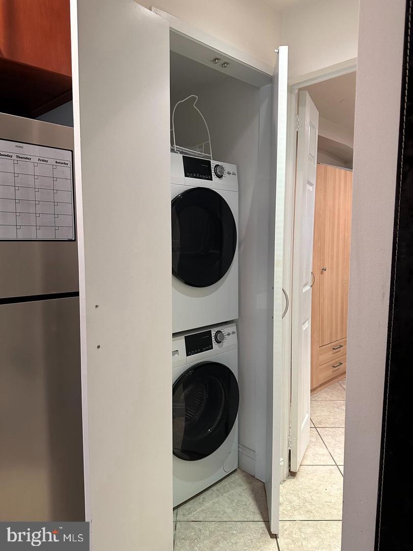 830 D Street Southeast, Unit B Washington, DC 20003 - Photo 21 of 23 a utility room with dryer and washer