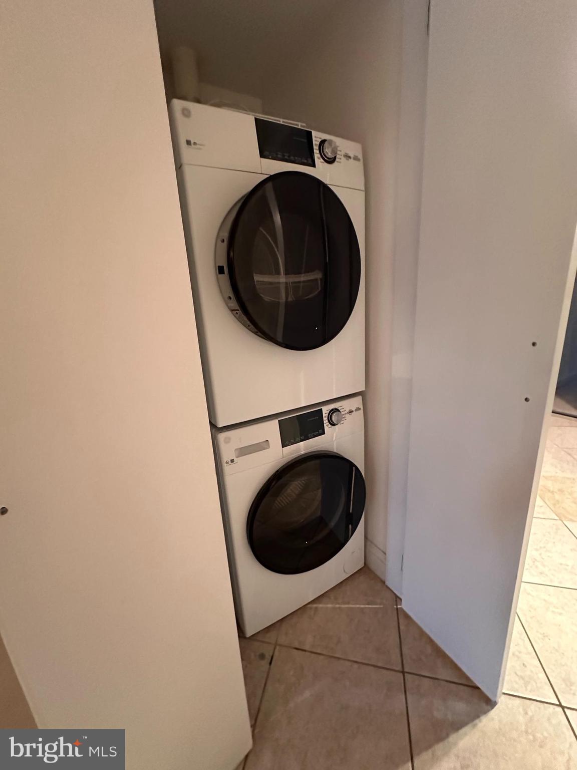 830 D Street Southeast, Unit B Washington, DC 20003 - Photo 22 of 23 a utility room with dryer and washer