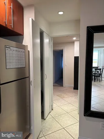 a view of hallway with dining area
