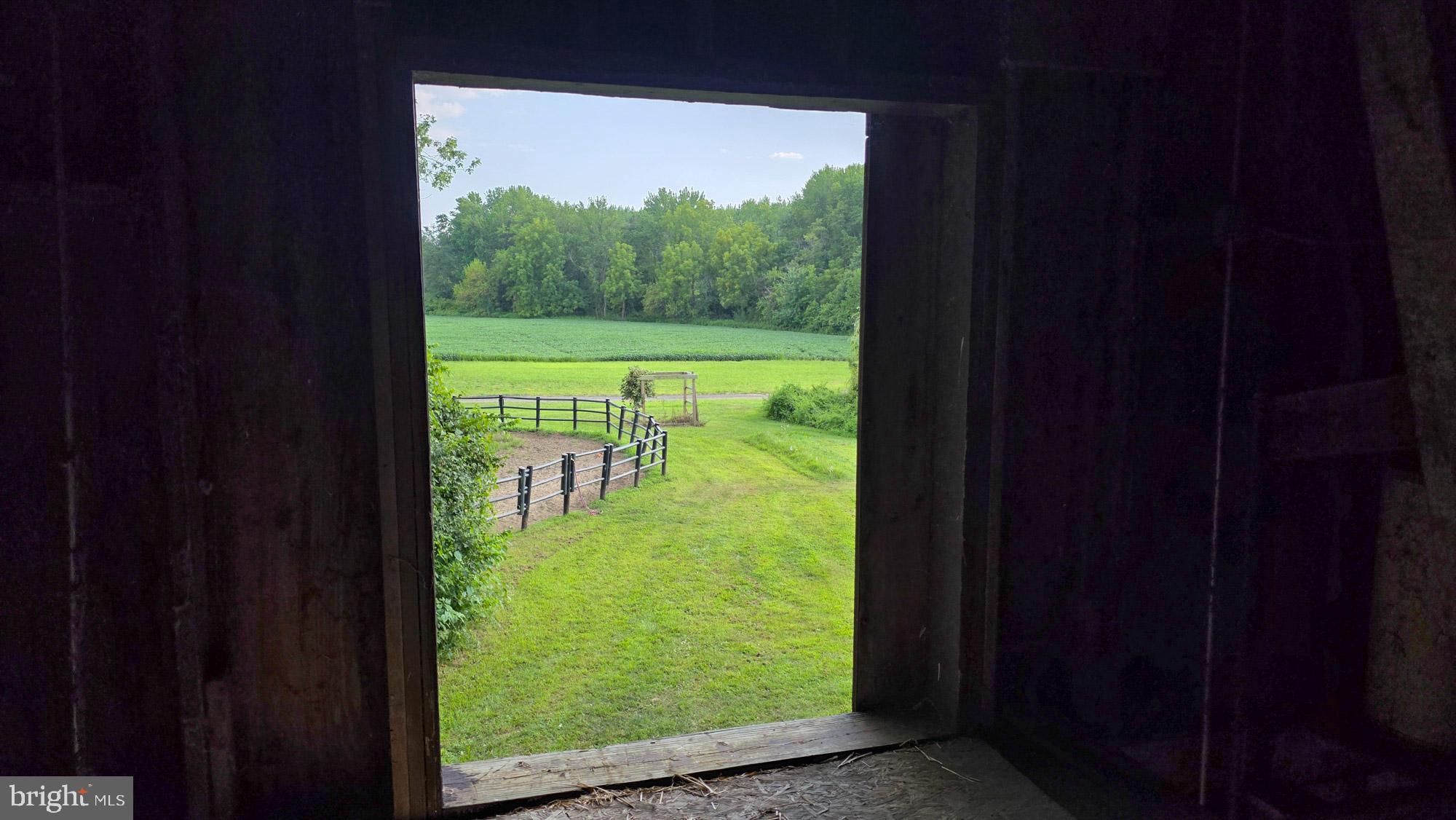 58 Sykesville Road Chesterfield, NJ 08515 - Photo 54 of 144 Framed by rustic charm, nature's embrace.