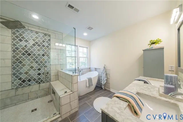 a bathroom with a sink toilet and mirror