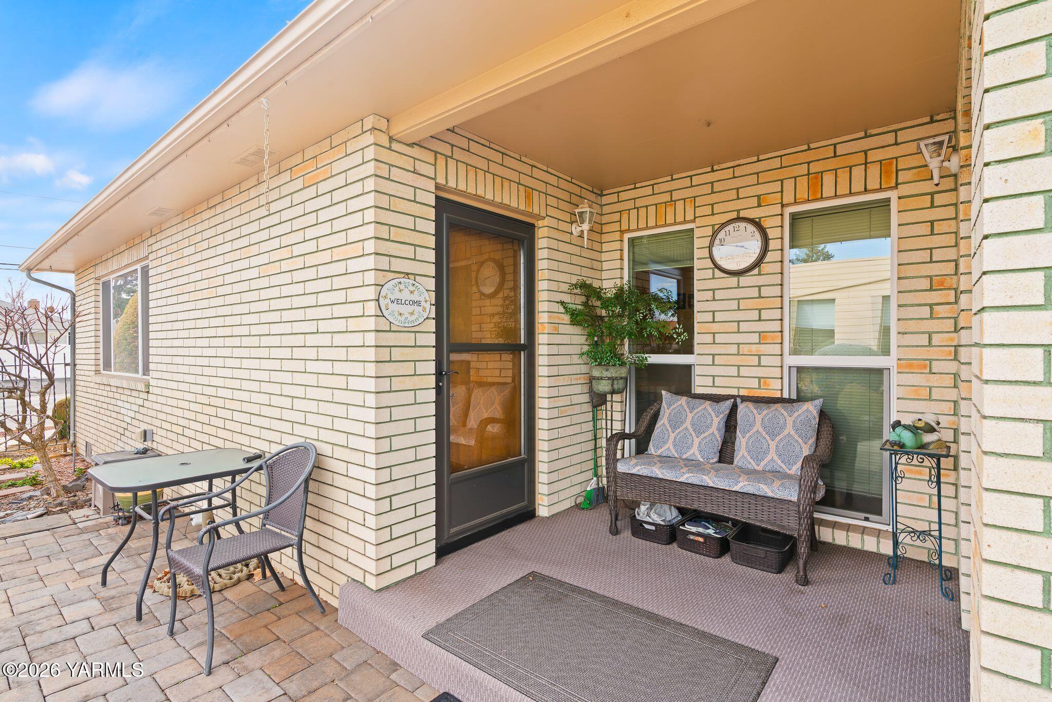 5701 West Chestnut Avenue, Unit 1 Yakima, WA 98908 - Photo 5 of 26 a building outdoor space with patio furniture