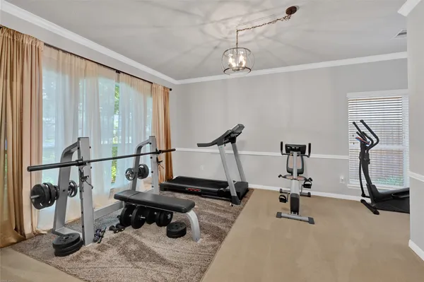 a view of a room with gym equipment