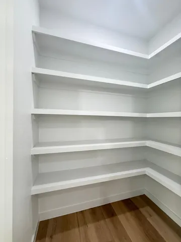 a view of a room with shelves