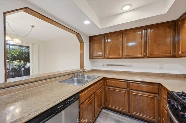 a stove top oven sitting inside of a kitchen