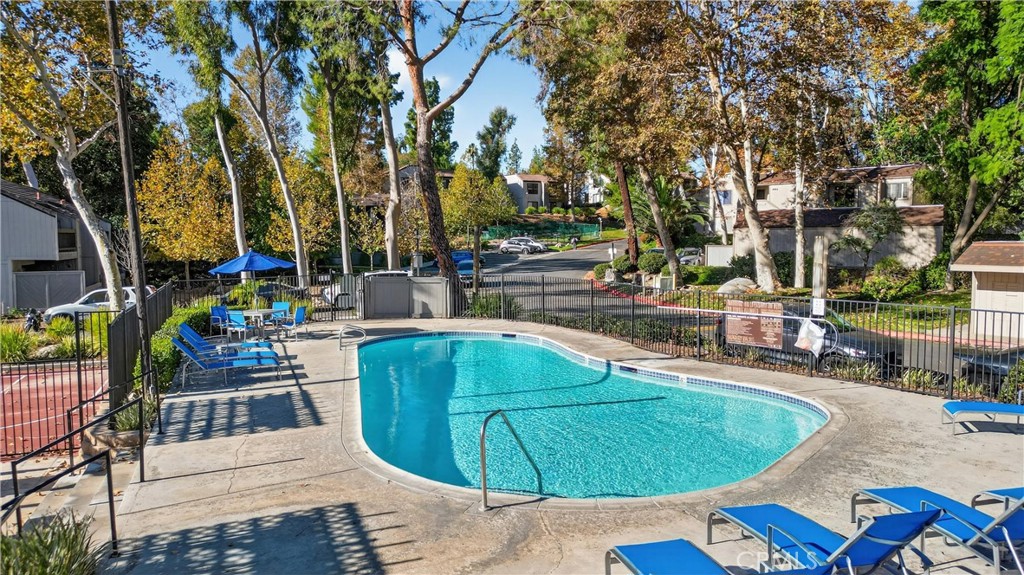 600 Central, Unit 291 Riverside, CA 92507 - Photo 26 of 35 a view of a swimming pool with outdoor seating