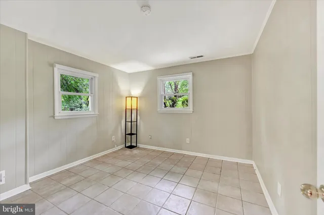 an empty room with windows