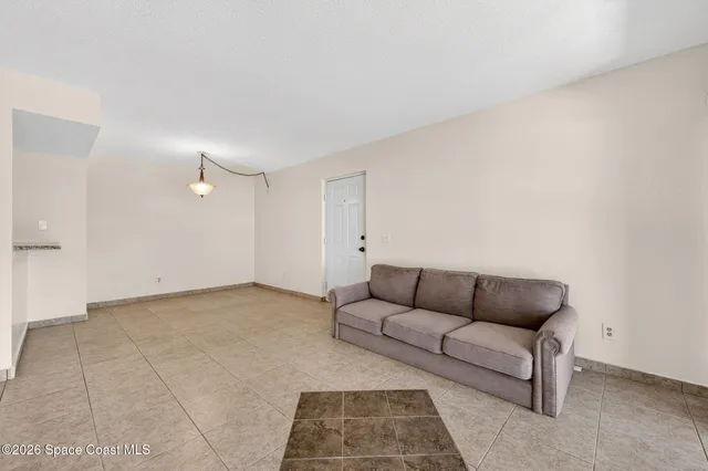 a view of kitchen cabinets and sink