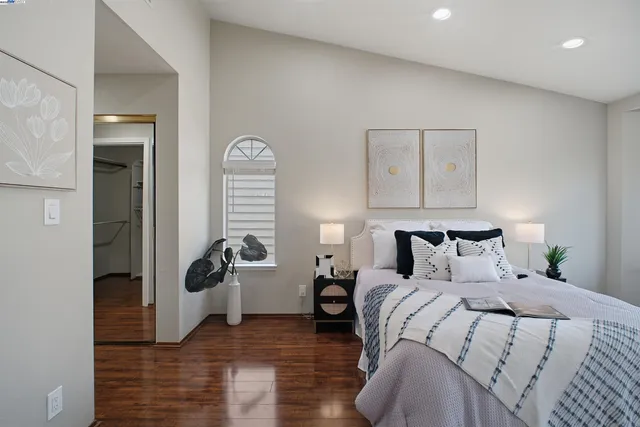 a bathroom with a sink double vanity granite tub and shower