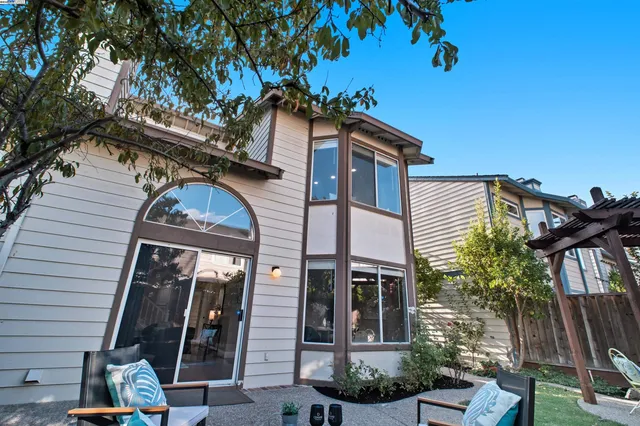 a view of livingroom with furniture and floor to ceiling window